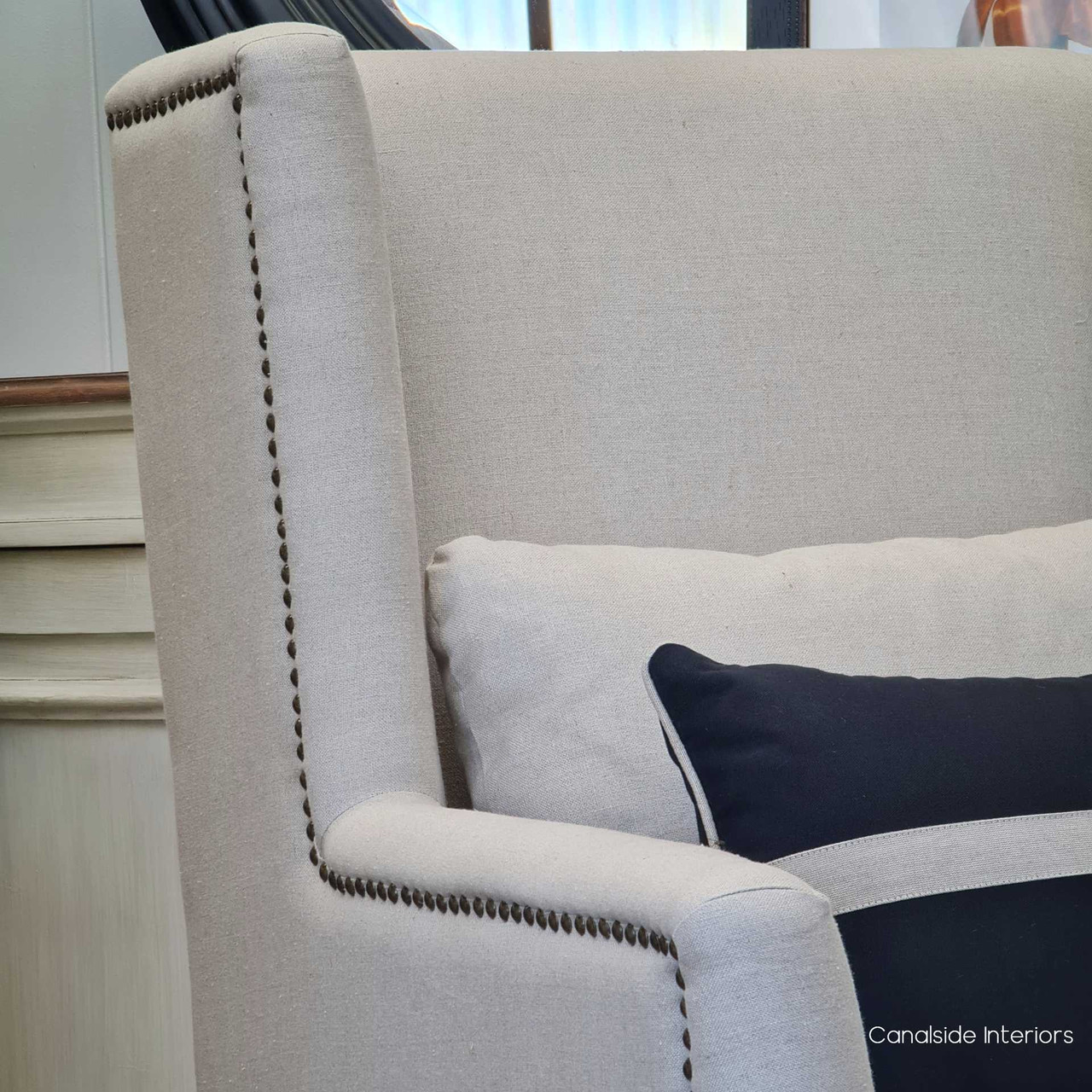 The Bayview Armchair amidst contemporary decor, showcasing its ability to complement both modern and traditional interiors seamlessly.