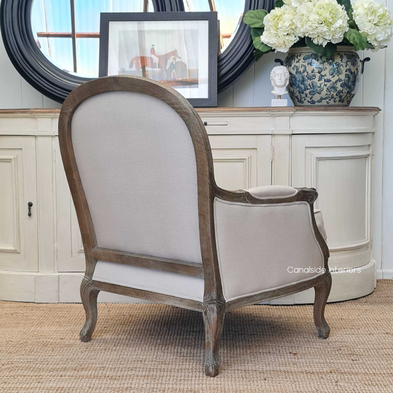 The Monette Armchair positioned in a bedroom, demonstrating its versatility and timeless design, complementing a wide range of decors from modern to classical.