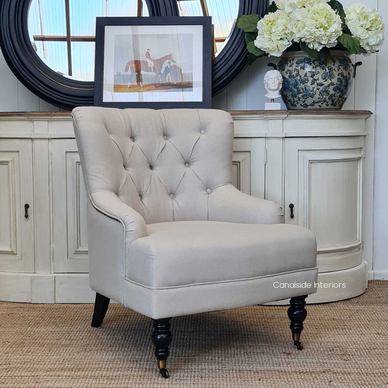 Angled shot illustrating how the armchair complements a classical interior, adding a layer of richness and cultural depth.