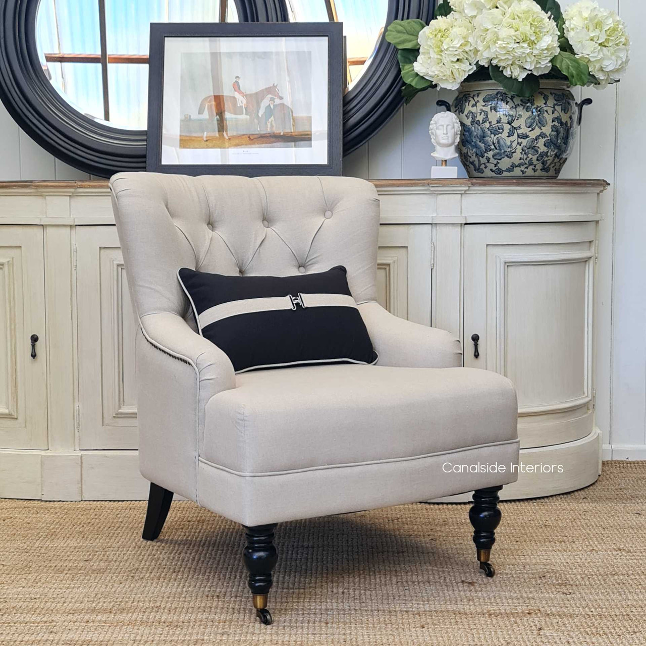 Angled shot illustrating how the armchair complements a classical interior, adding a layer of richness and cultural depth.