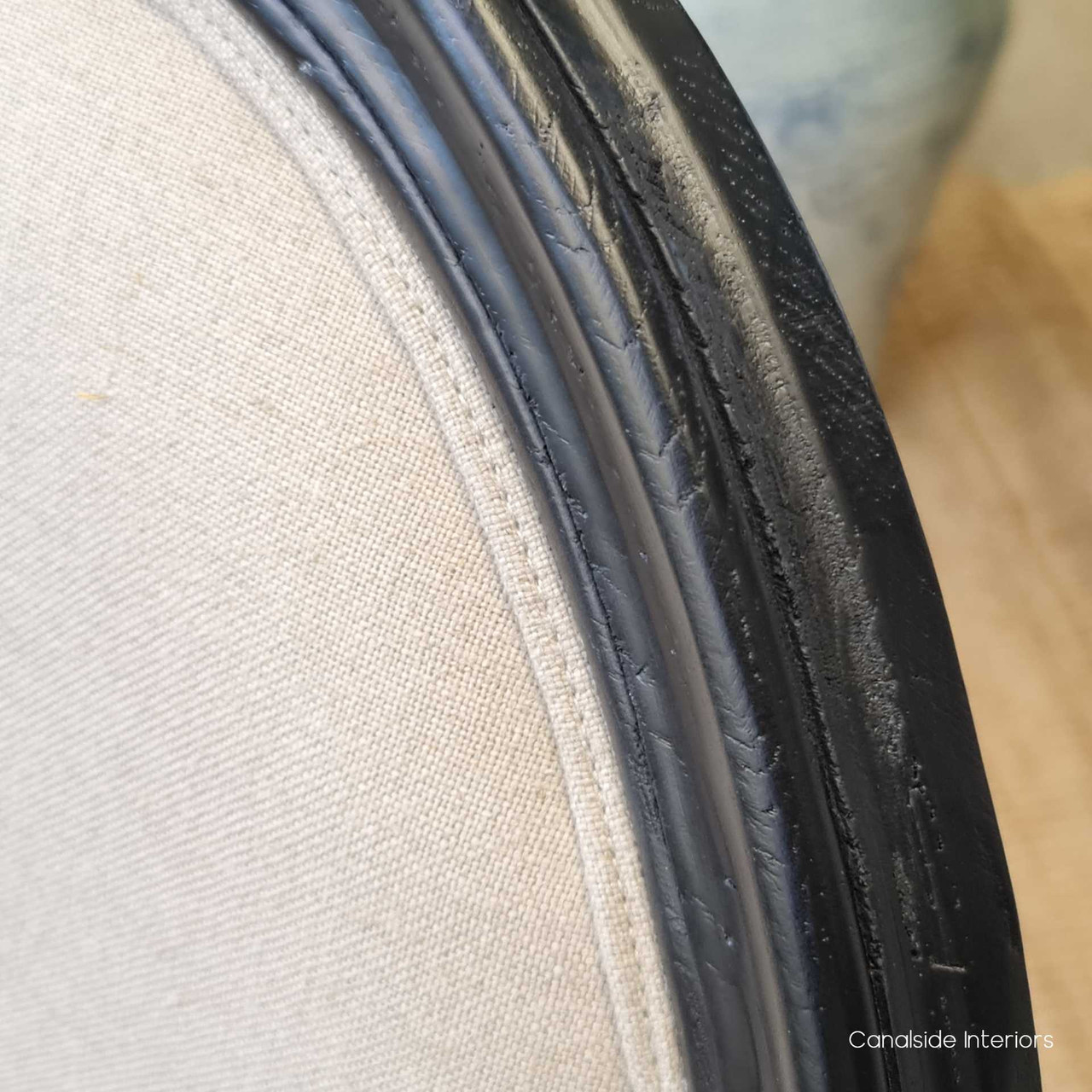 Sansa's hand-crafted oak frame and cream linen blend seamlessly into a provincial lounge room decor - Canalside Interiors.