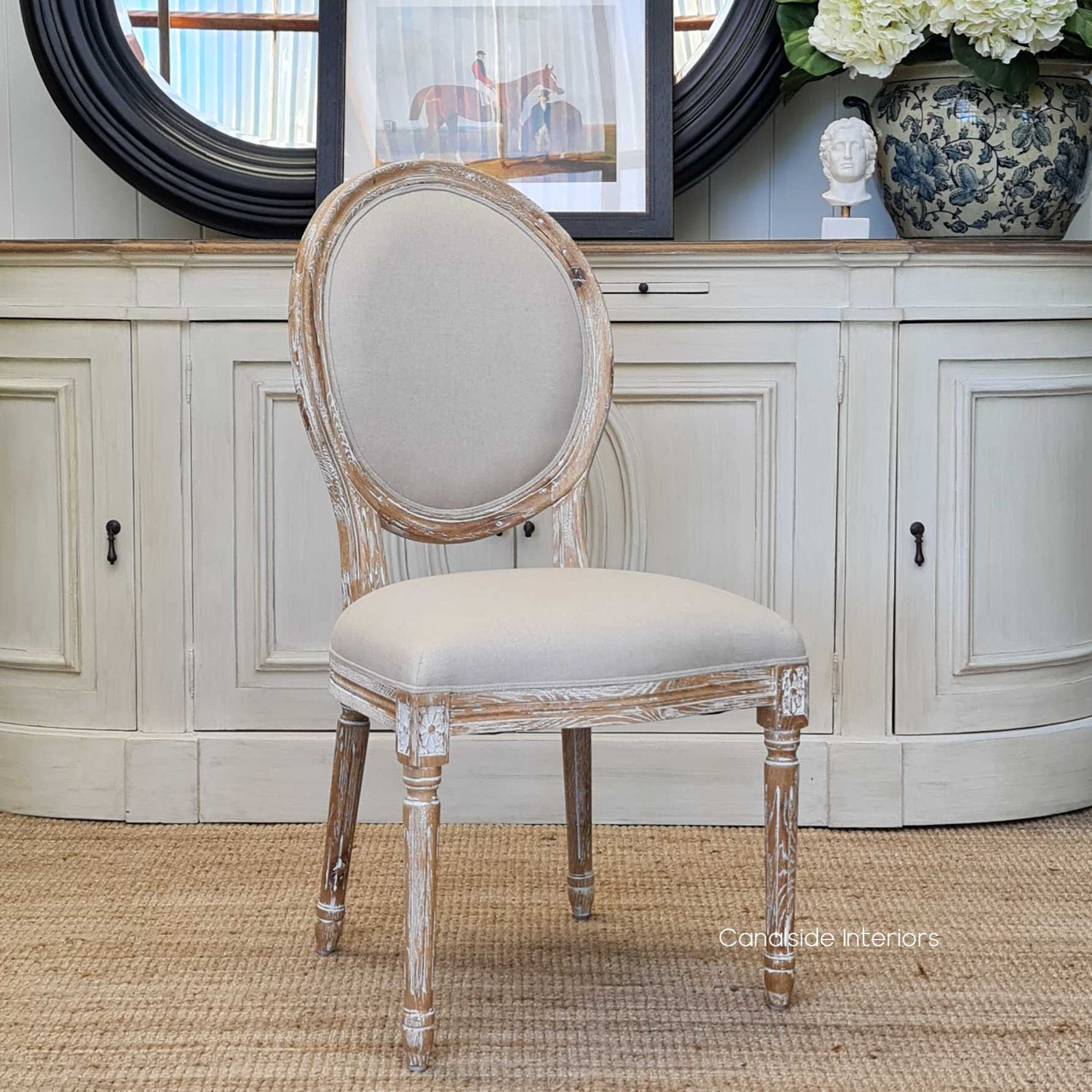 A dining room graced with the Sansa Dining Chairs transforms into a space of classical allure and comfort - Canalside Interiors