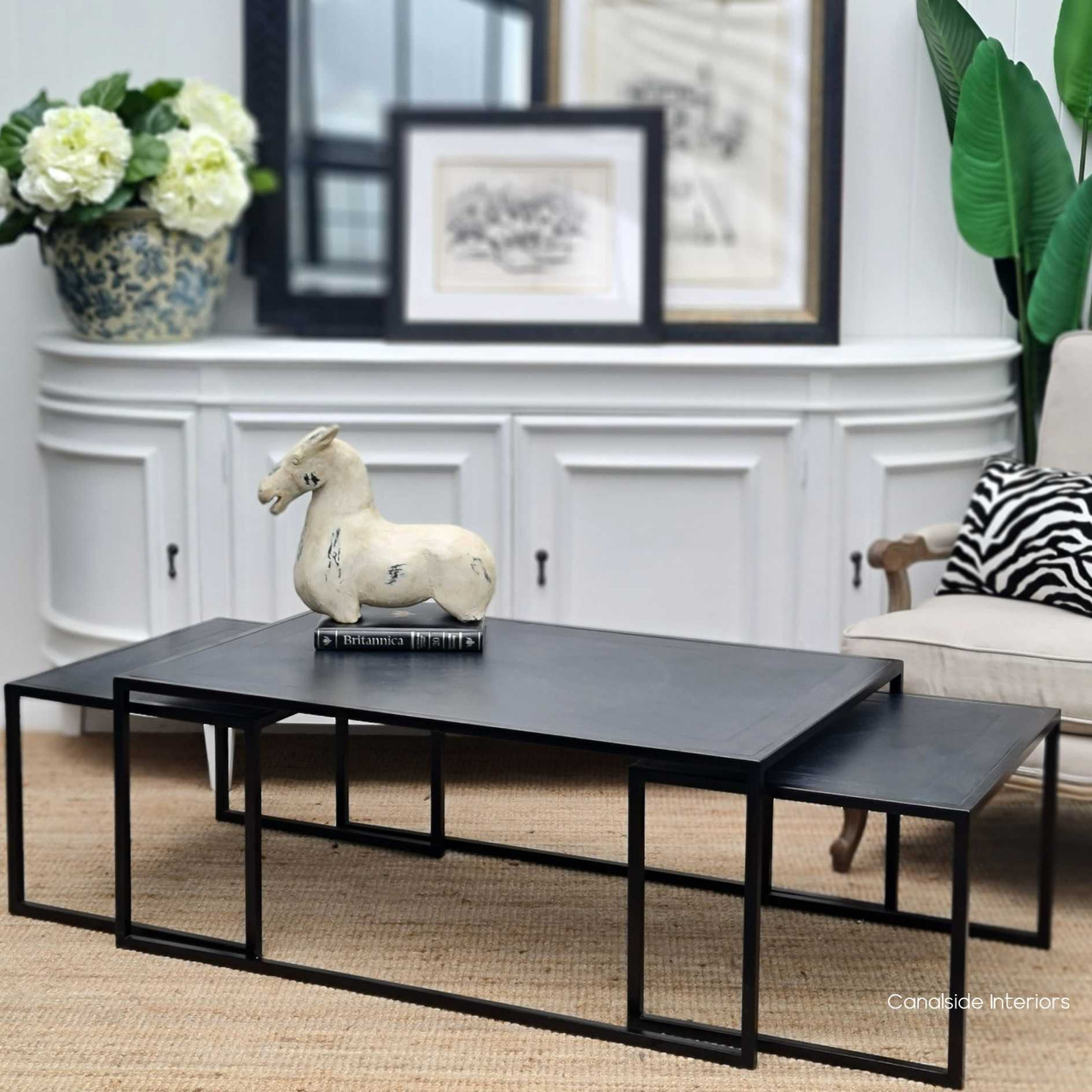 The Brienne nesting tables positioned to form a creative and artistic arrangement, showcasing the set's adaptability to personal style.