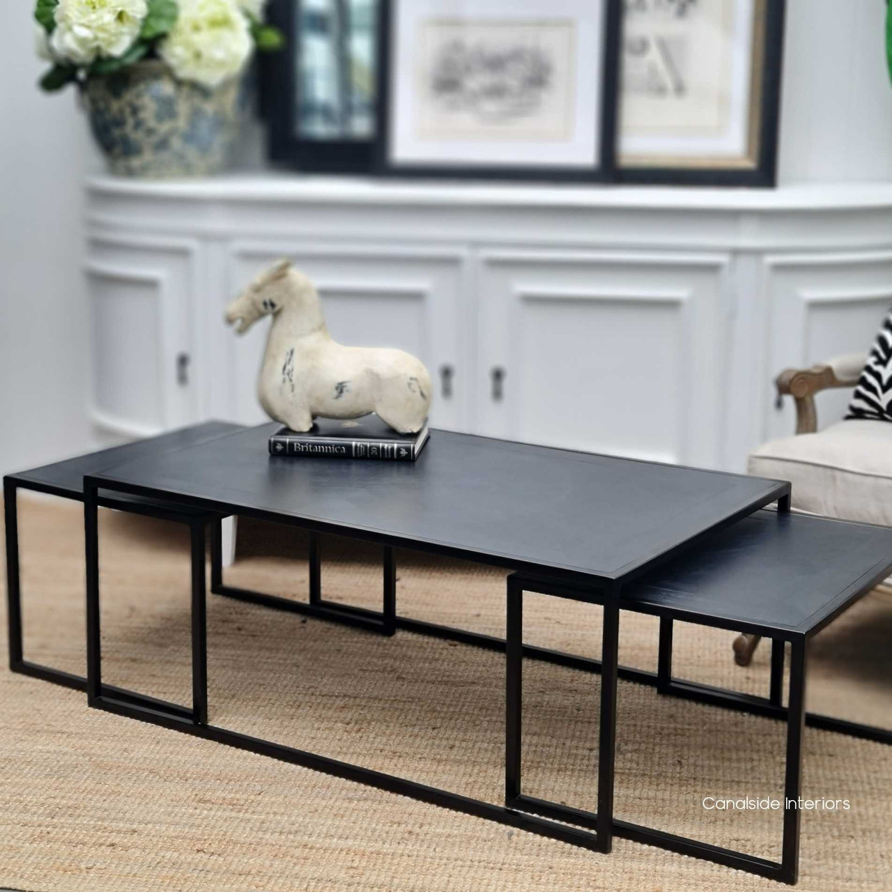 The Brienne coffee tables set against a neutral backdrop, illustrating how they enhance the overall aesthetic of the room.