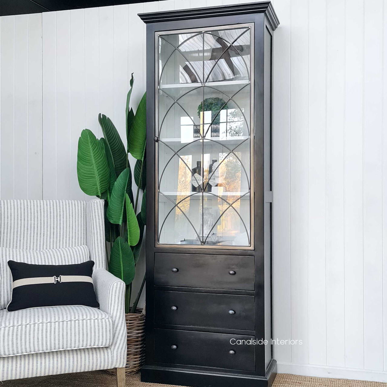 Side perspective of the cabinet, showcasing its slim profile that makes it an ideal choice for adding sophistication without overwhelming a space.