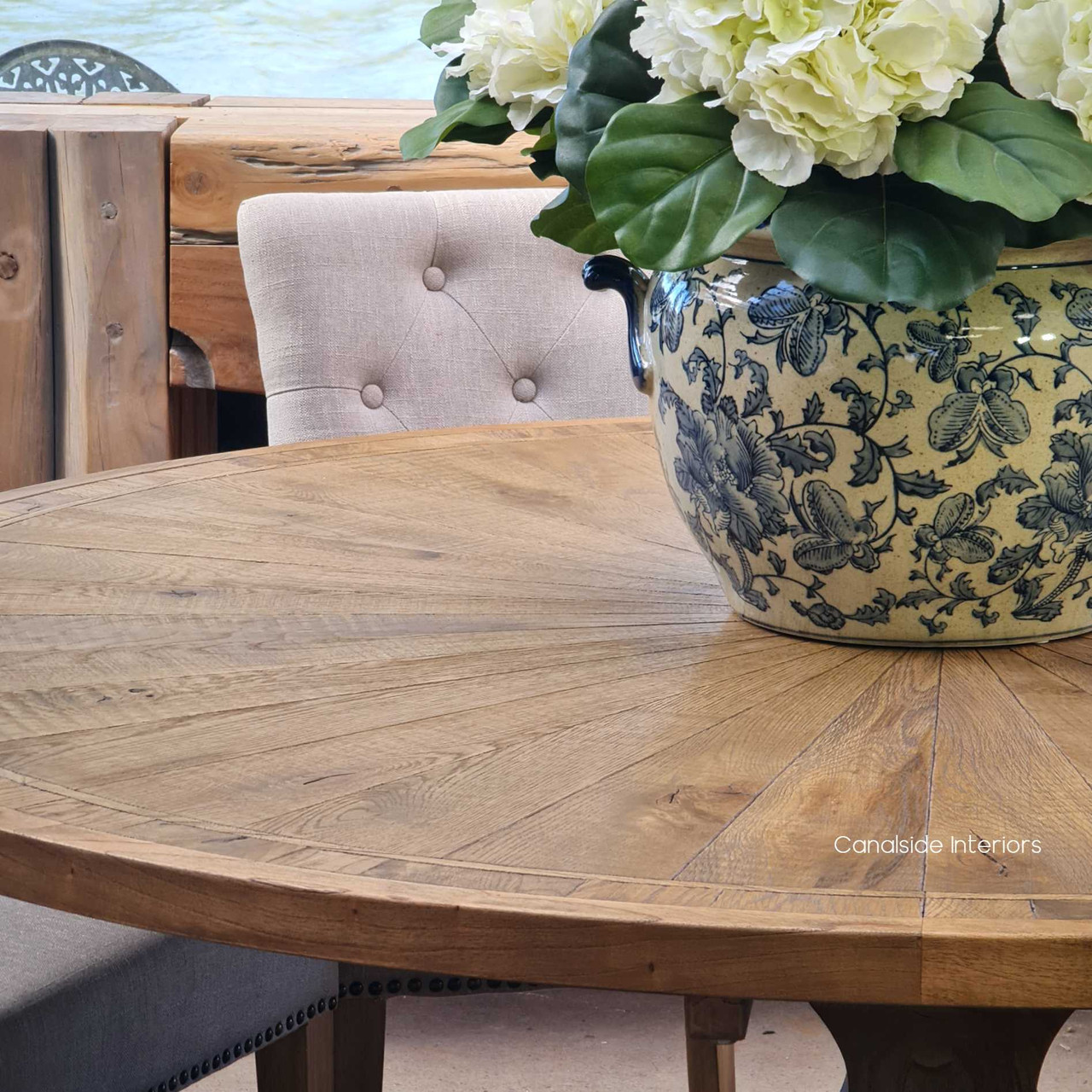 The Danbury's sturdy oak design and detailed wood pattern provide a durable surface for family meals and sophisticated library gatherings alike