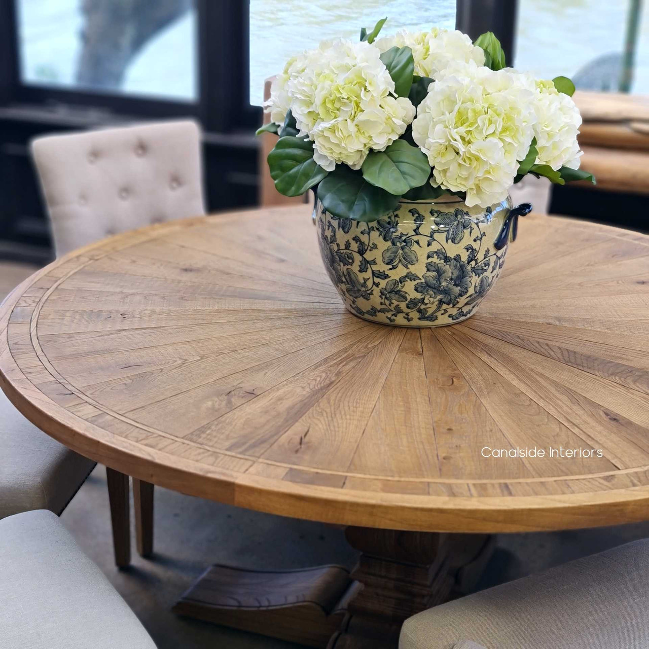 Understated yet commanding, the round design of the Danbury Oak Table invites conversation and communal dining, perfect for the contemporary Sydney home - Canalside Interiors