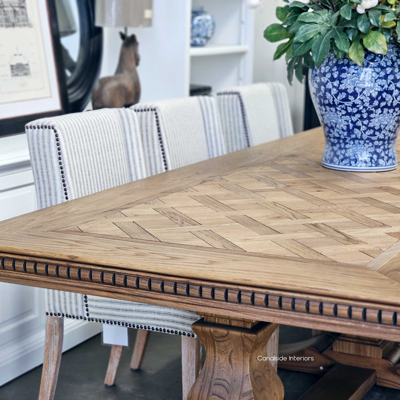 Angled shot illustrating how the dining table complements an elegant interior, adding a layer of sophistication and opulence.