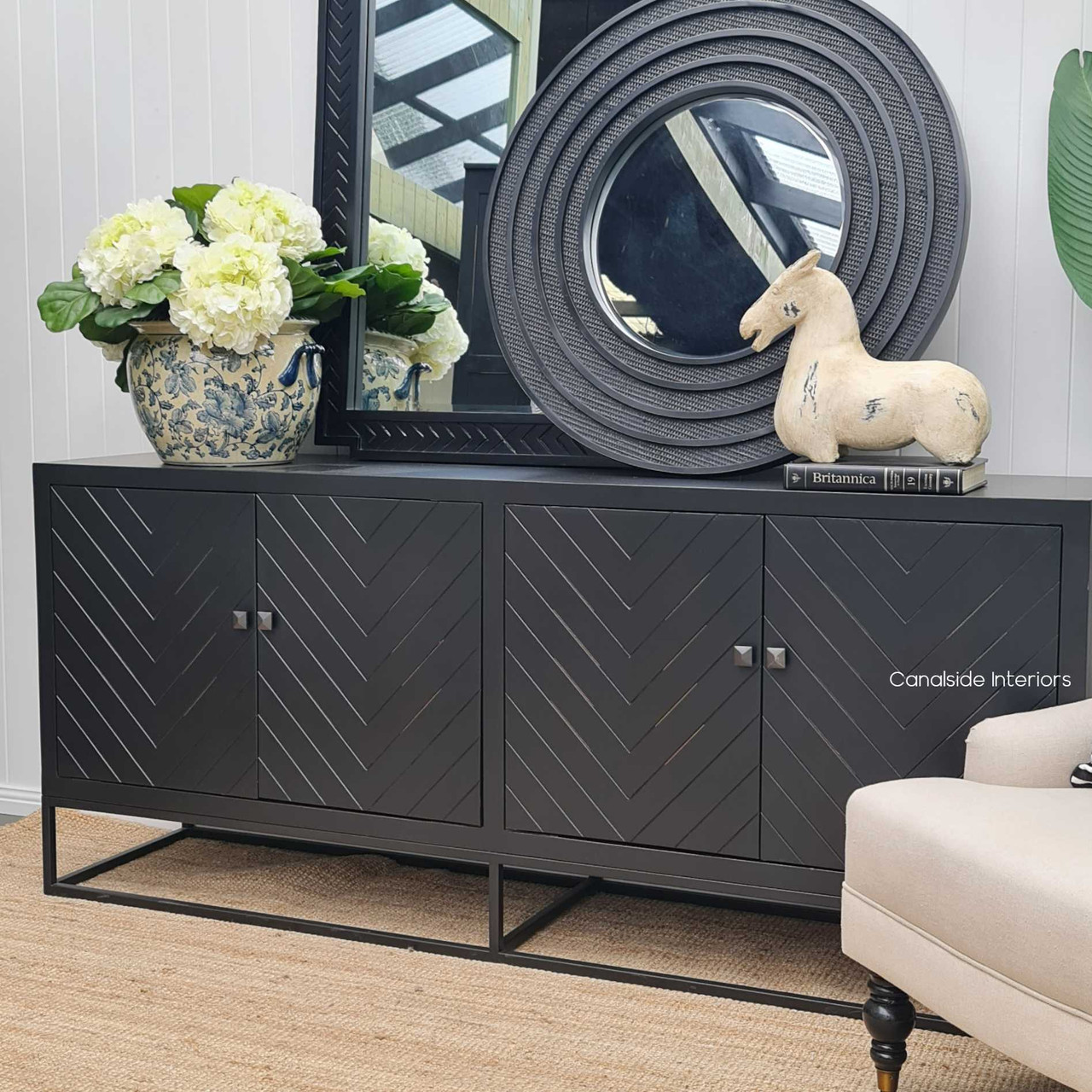Elegance meets function with this Canalside Interiors sideboard, featuring a sophisticated herringbone pattern and ample storage for living spaces.