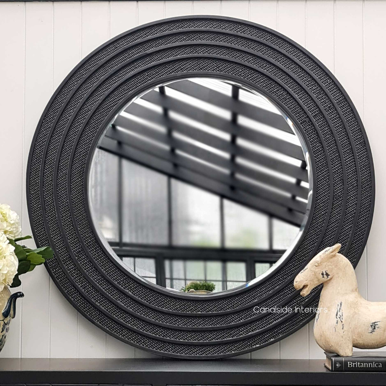 Detail shot of the distressed black/charcoal finish, showcasing the mirror's casual yet classic appeal, perfectly on-trend with contemporary tastes.