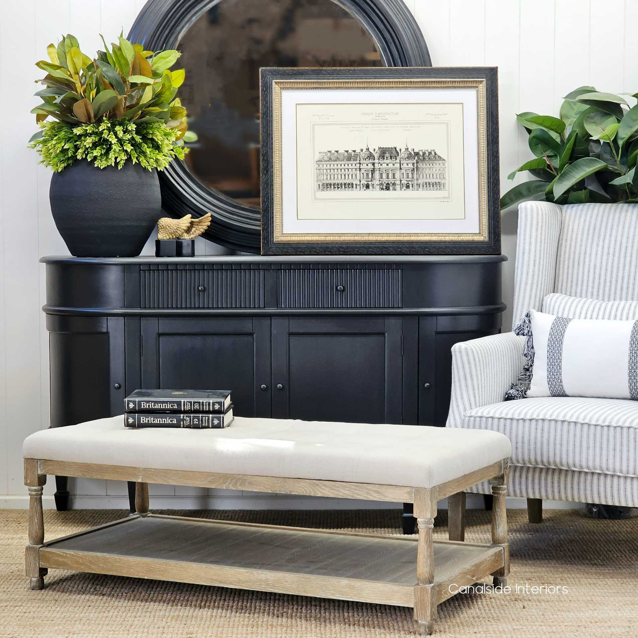 Side view of the Providence Ottoman, capturing the elegant profile and the harmonious balance between rustic charm and sophisticated design.