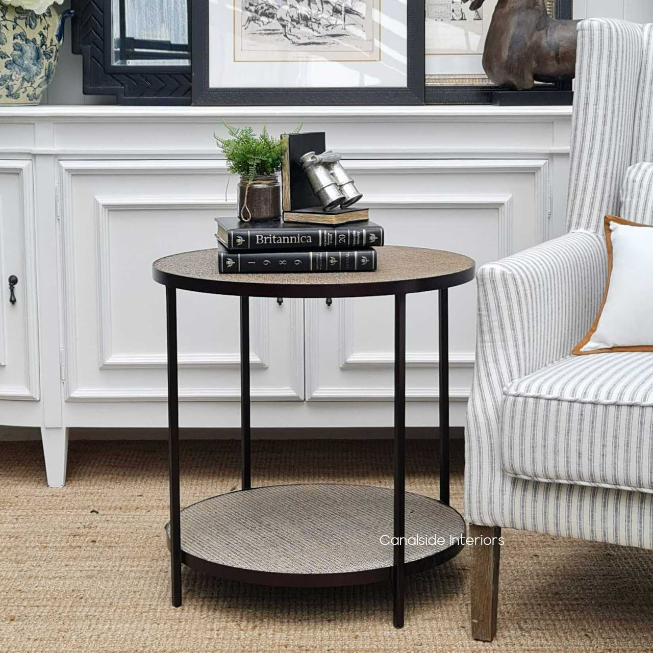 The Knox Rattan Nesting Coffee Tables, with their chic tempered glass and natural rattan tops, are a versatile choice for a Hamptons-style living room – Canalside Interiors.