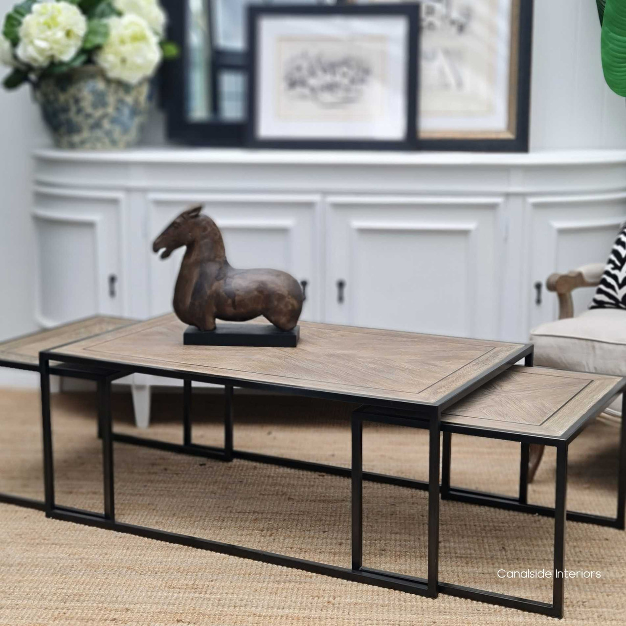Main view of the Brienne Herringbone Nesting Coffee Table in distressed weathered oak, showcasing its modern and versatile design.