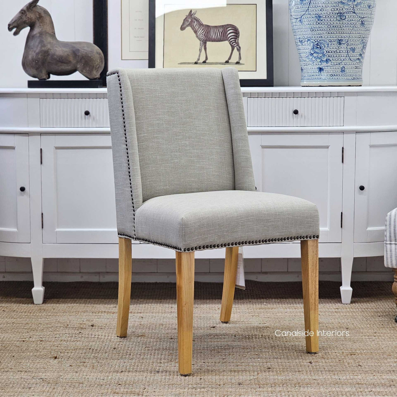 Leclerc Cream Chair with Brass Stud Detail, Timeless Appeal for Modern Living Spaces, Front Angled Perspective