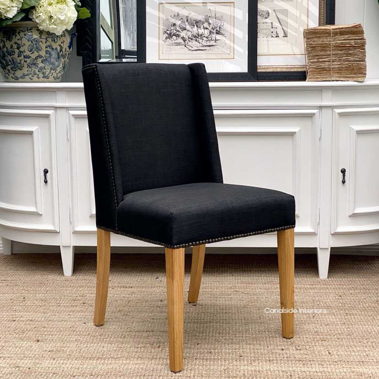 Experience timeless comfort with the Leclerc Dining Chair, featuring a linen blend seat and a classical design that suits any modern home