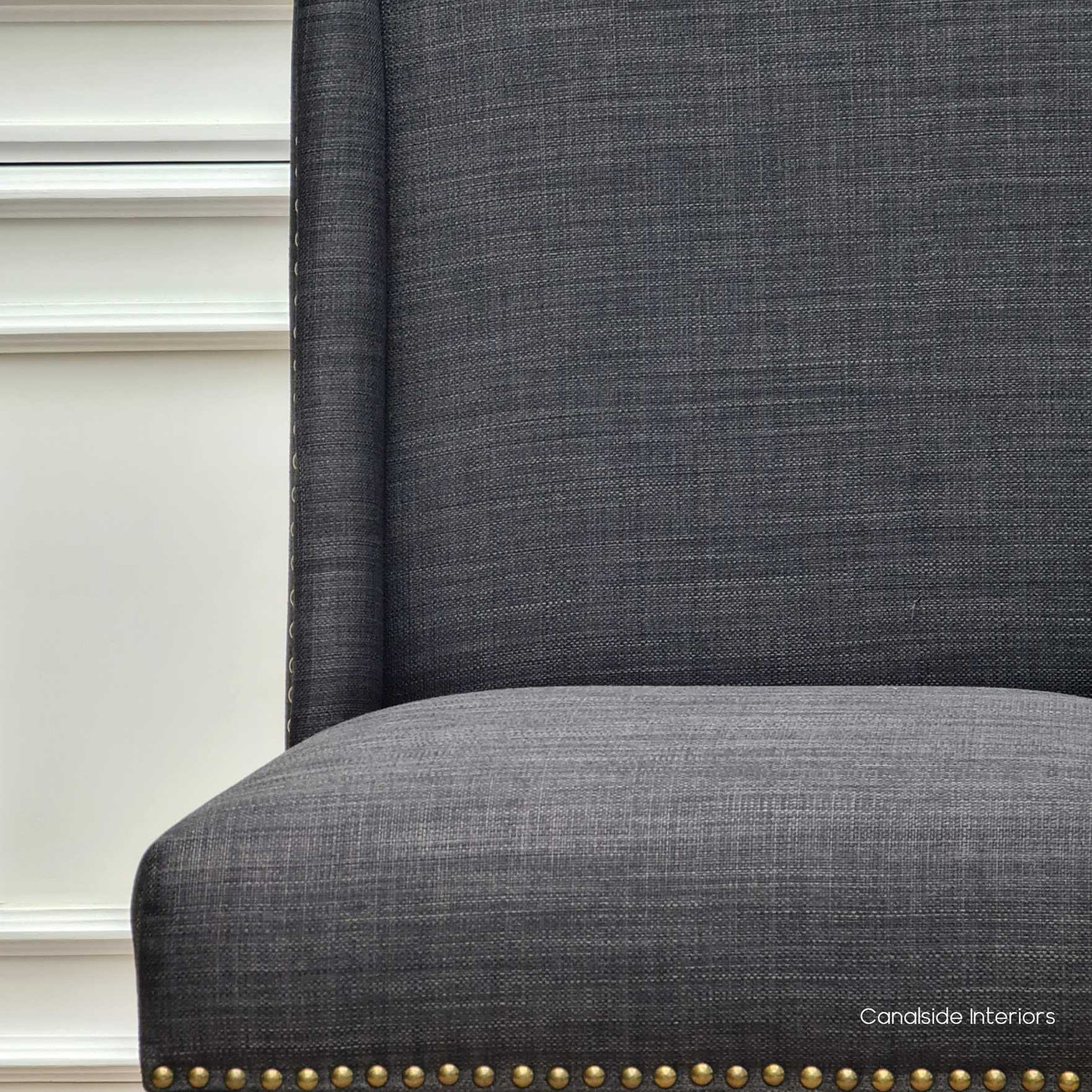 Accentuate your living space with the Leclerc Chair, where a linen blend upholstery meets the warm tones of natural oak legs