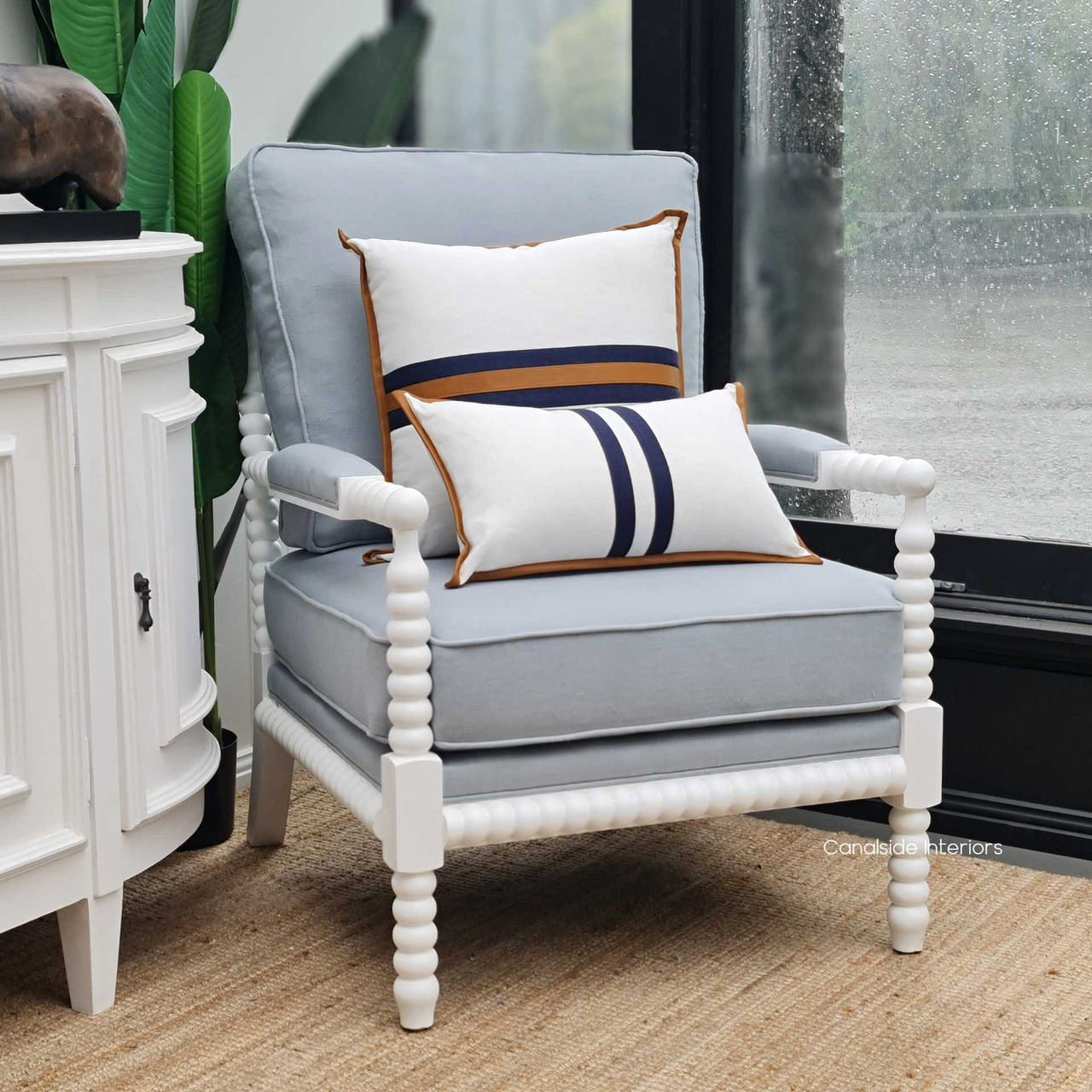 Profile shot showcasing the Bobbin armchair's perfect proportions for luxurious and comfortable seating.
