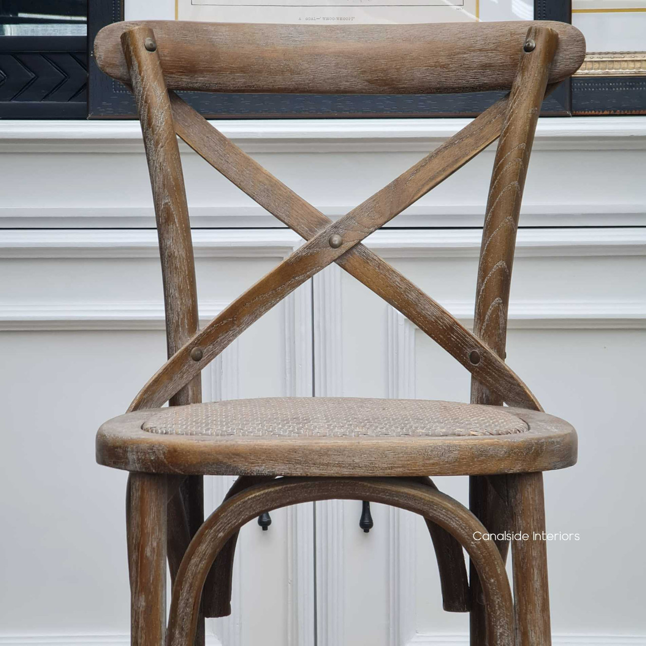 Timeless quality meets Hamptons style with this oak chair featuring no arms, adding a touch of charm to kitchen home, curated by Canalside Interiors