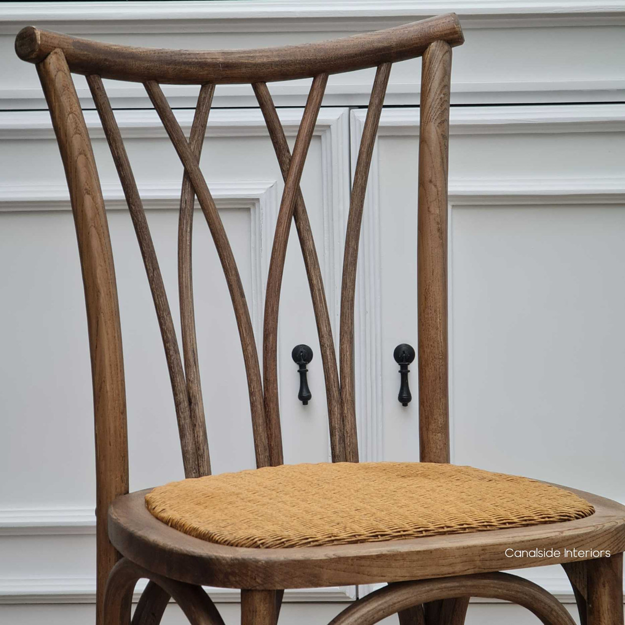 Botanica Dining Chair featured in a café setting, showcasing its suitability as both stylish and practical café furniture.