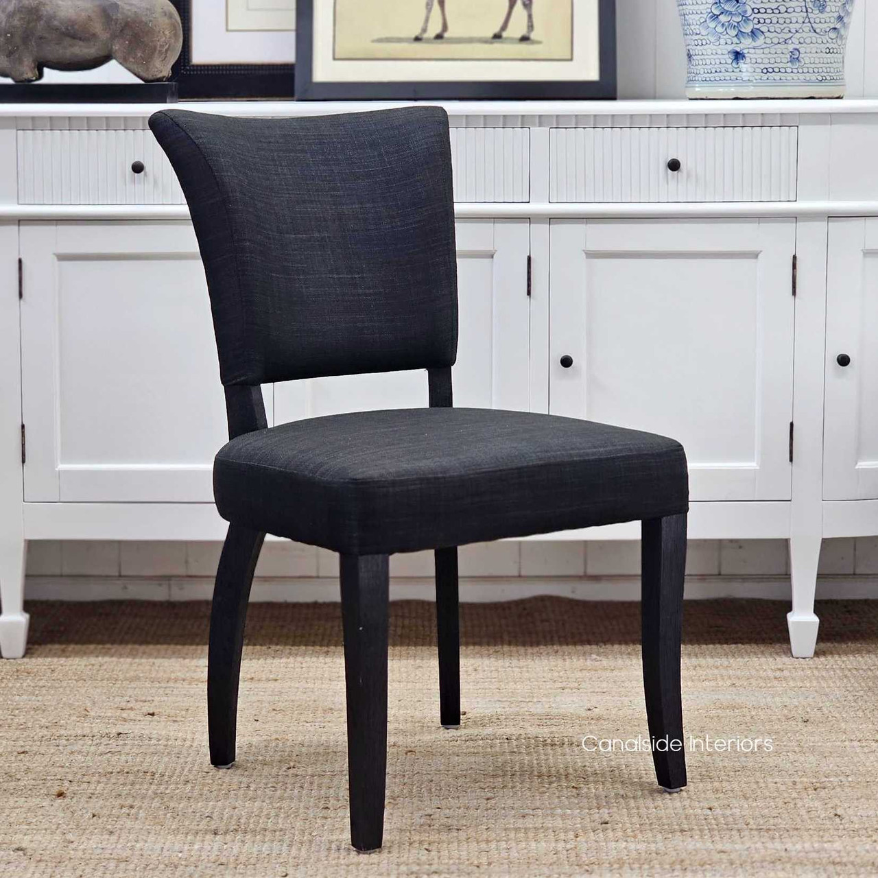 Mimi Upholstered Dining Chair, Modern Seating Option with Black Oak Legs, Angled View
