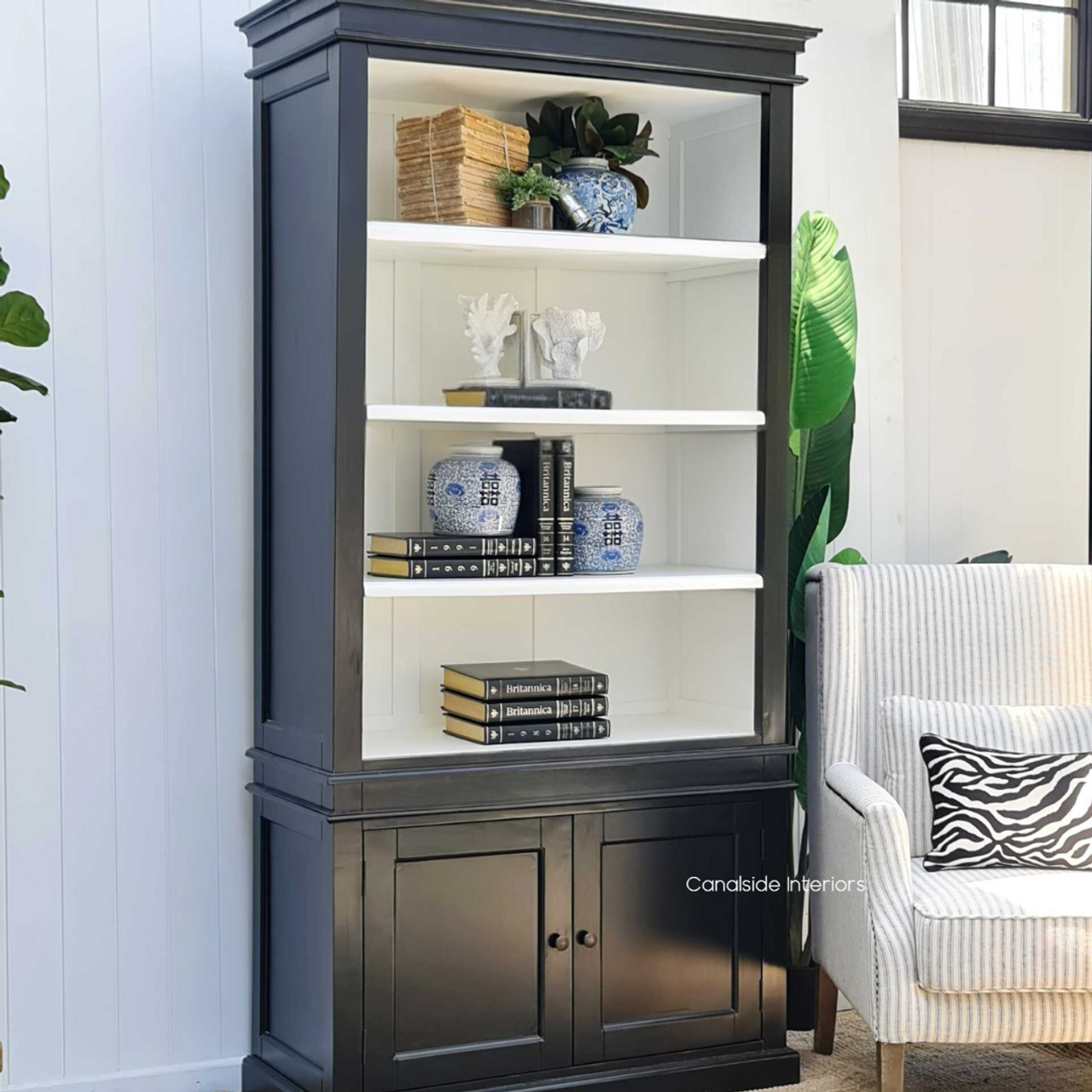 Perspective shot of the Grange Bookshelf, aligned with chic decor, embodying a blend of modern and coastal themes