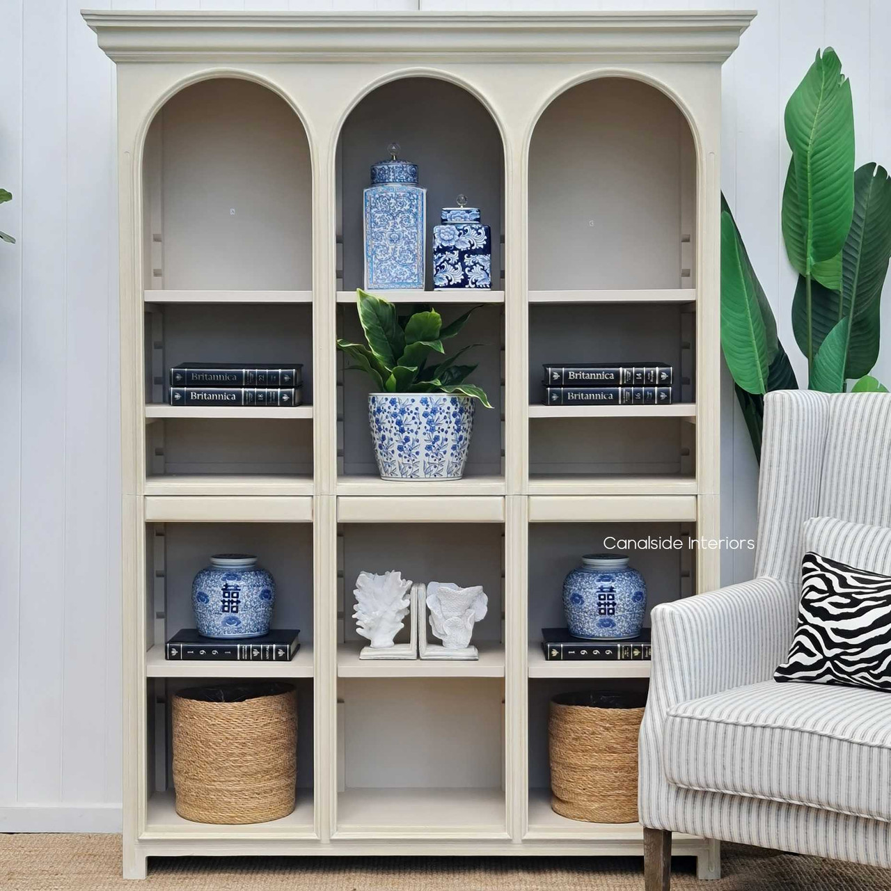 Biblioteque Bookshelf adorned with decor, demonstrating its functionality and stylish appeal in a modern bedroom setting
