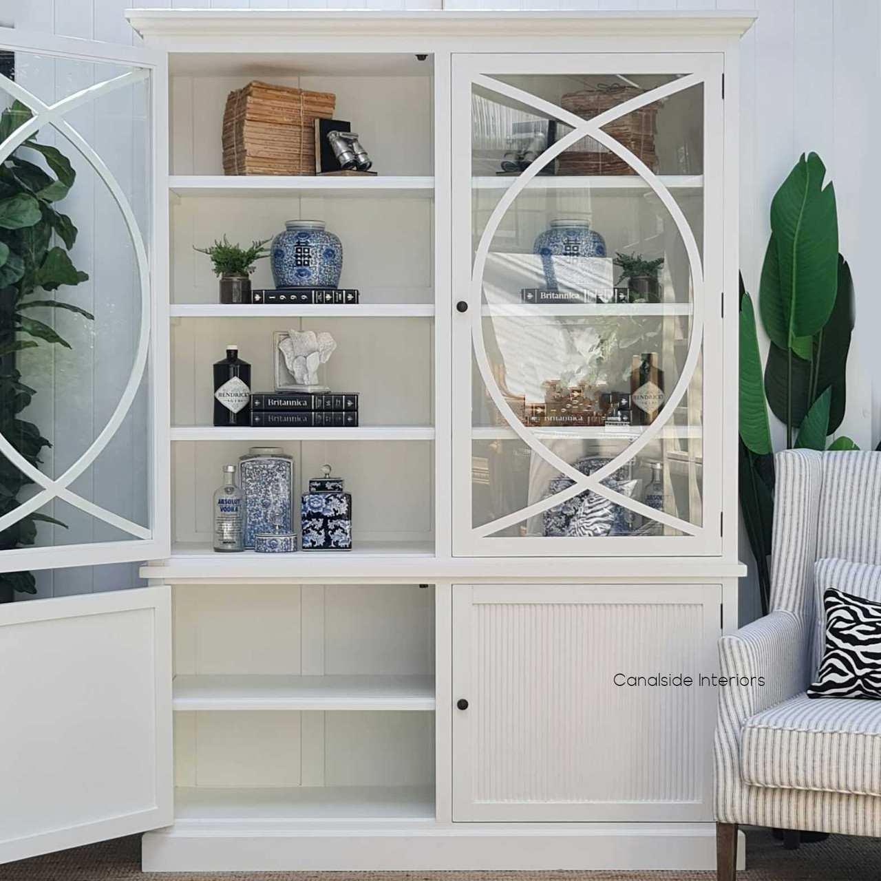 The Riviera's open doors revealing shelving space, ideal for a display of books and treasures in a personal library