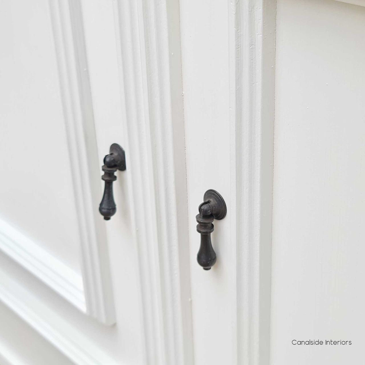 Close-up of the Francia Cupboard doors, showcasing the fine workmanship in line with Canalside Interiors' classical design ethos