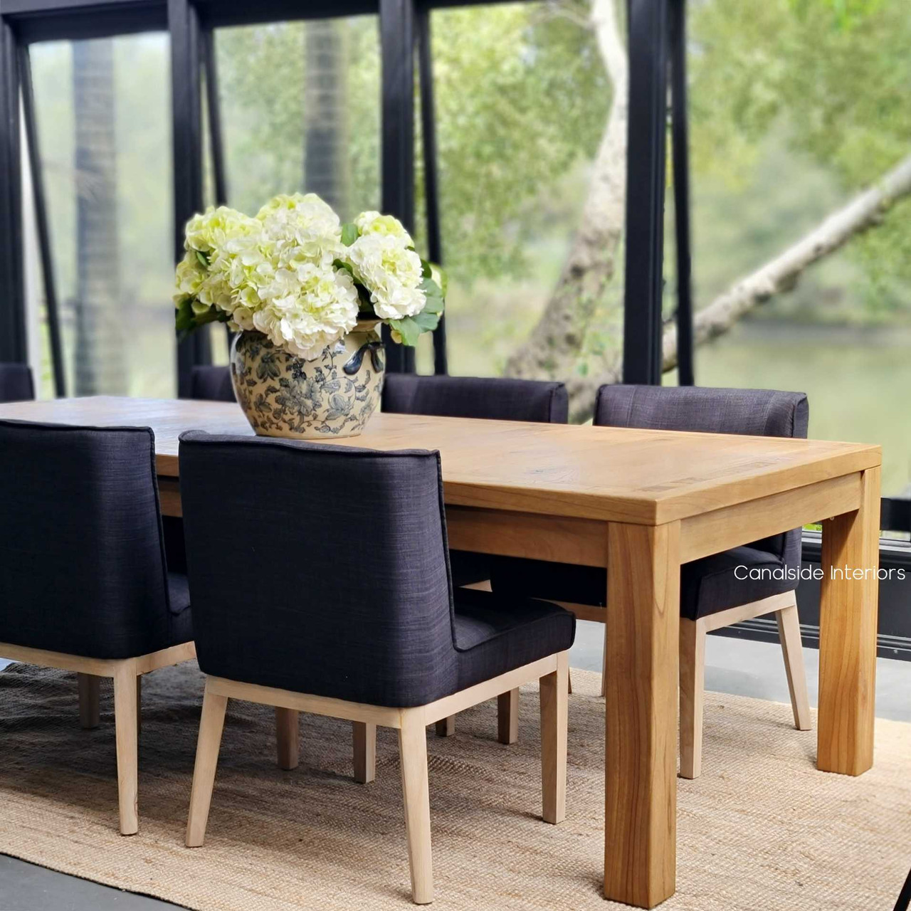 The Hayworth table, featuring the minimalist design and stability of reclaimed American oak.