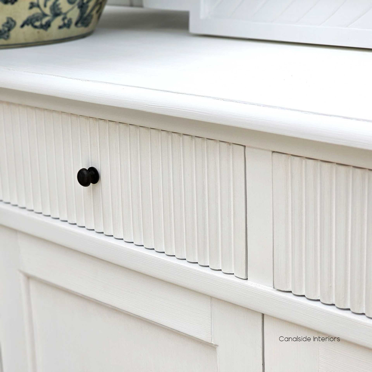 Close-up on the detailed craftsmanship and distressed finish of the French Louis Buffet Petite, illustrating Canalside Interiors’ attention to detail.