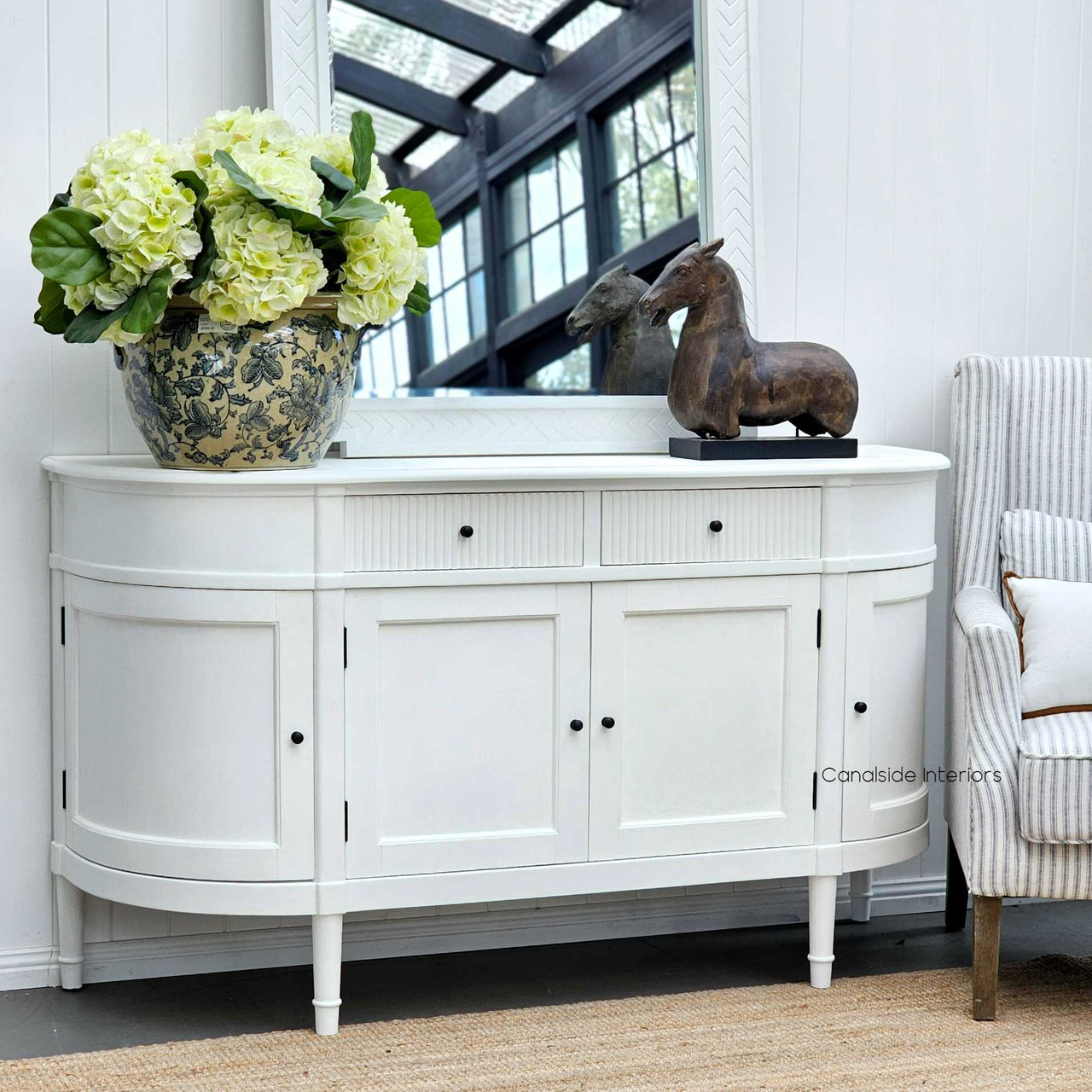 Elegant side profile of the French Louis Buffet Petite, highlighting its classic silhouette against a modern decor backdrop.