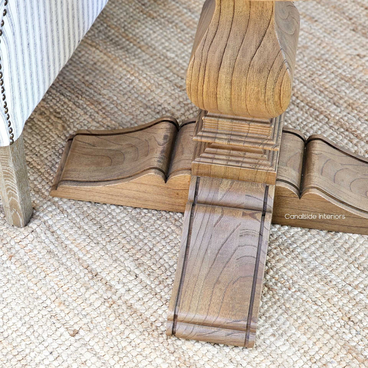 Close-up of the pedestal base of the Danbury Oak Parquetry Table, reflecting its classical design and solid oak heritage