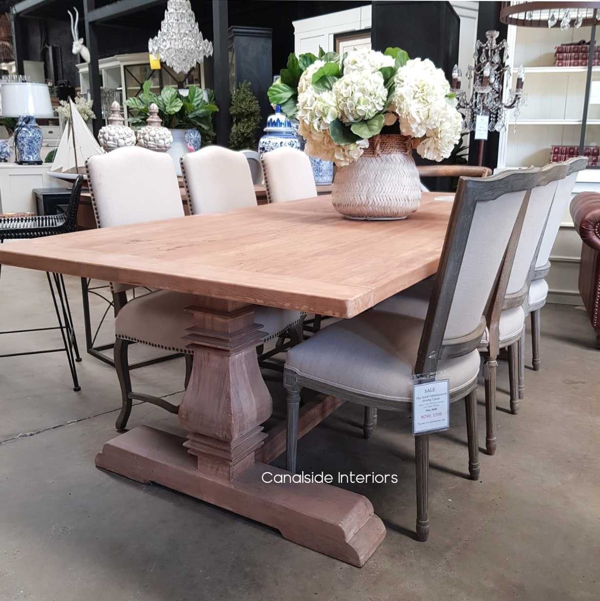 Close-up of the table's edge, displaying the fine finish and attention to detail synonymous with Canalside Interiors