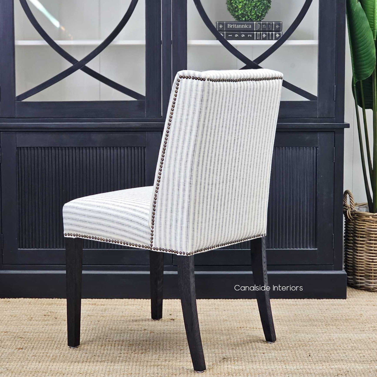 Back view of the Leclerc Chair, highlighting the winged back design, a classic feature for modern living spaces.
