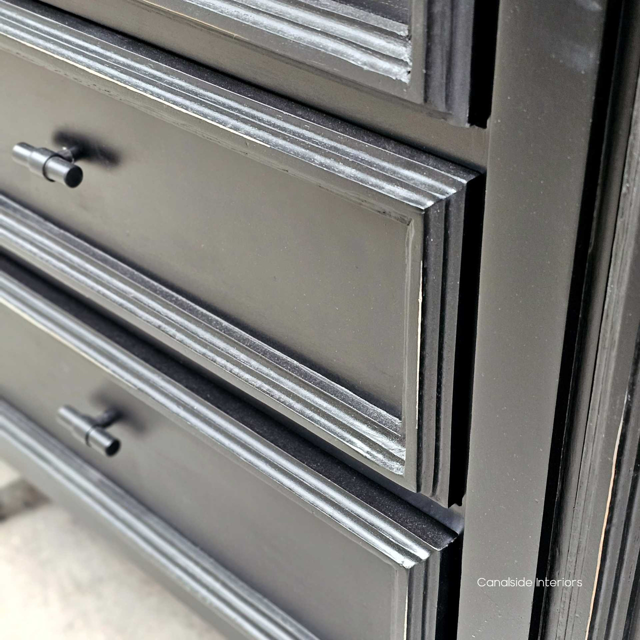 Close-up of the Francia Petite Sideboard's heavy distressing, highlighting the craftsmanship and timeless design.