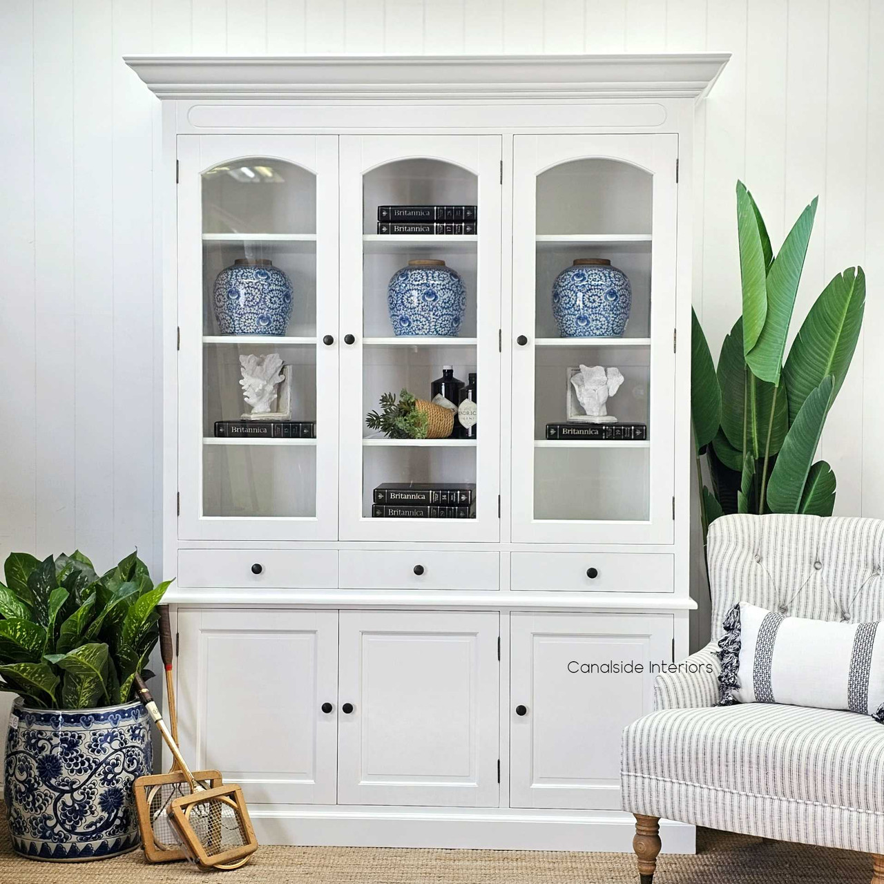 The Key Largo's glass doors open to reveal spacious storage, perfect for crockery display in any sophisticated Sydney dining area