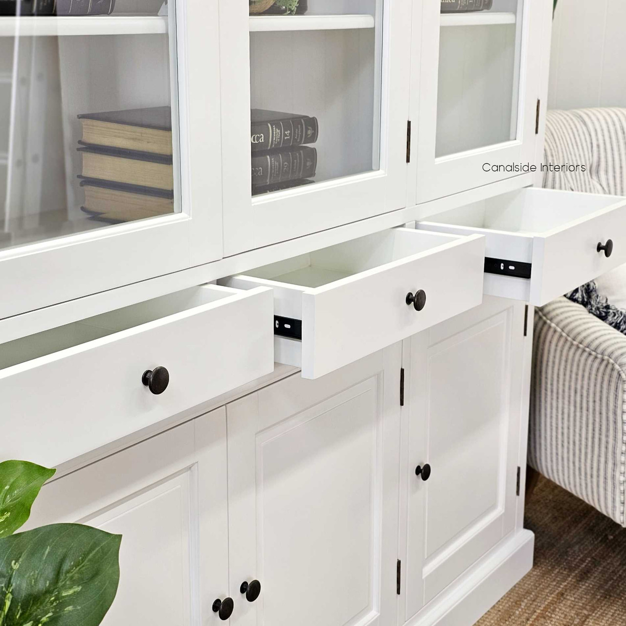 The white Key Largo Unit, with its elegant fluting and storage prowess, stands as a centrepiece in a home office