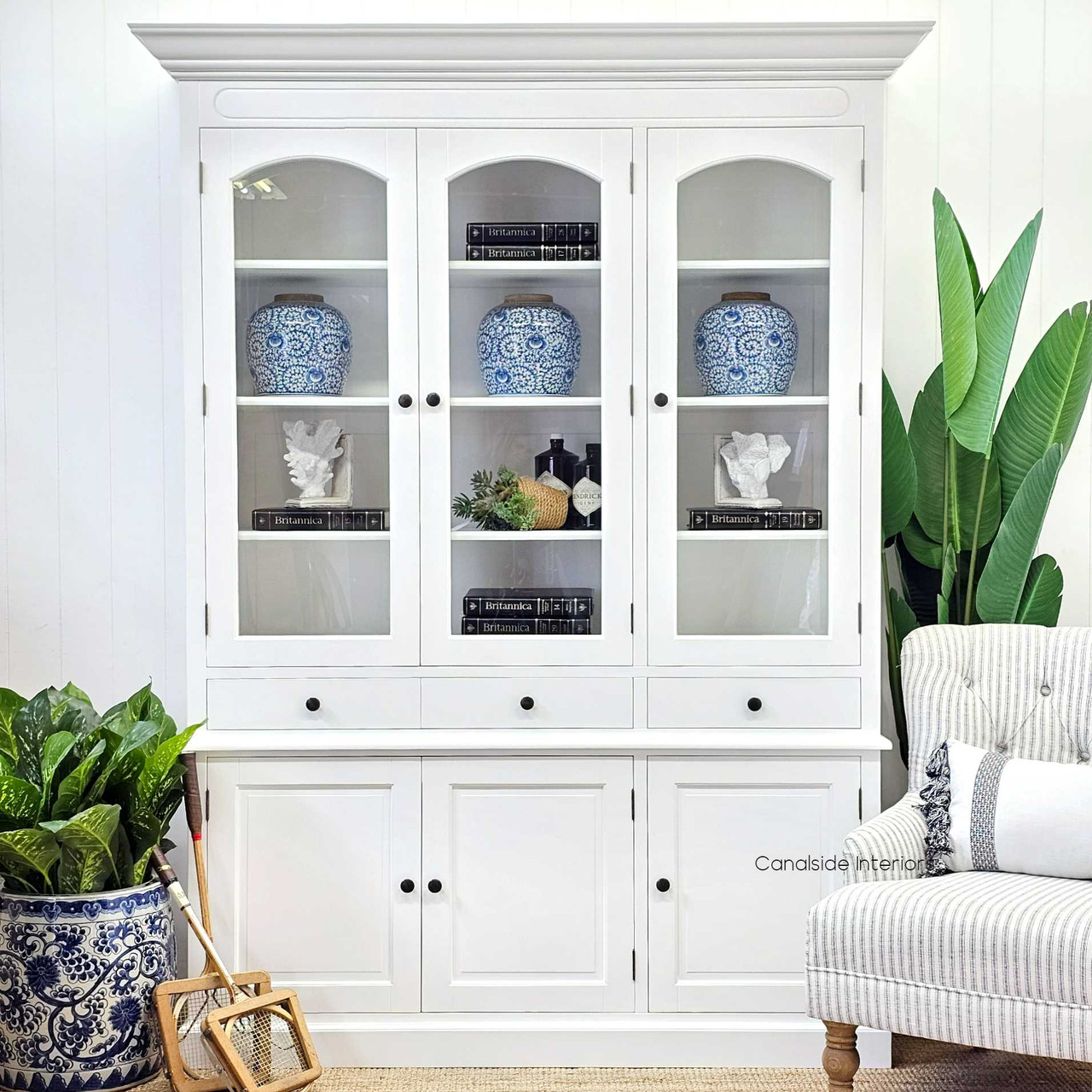 The Key Largo 3 Door Display Unit in white, showcasing elegant glass doors and handcrafted detailing – a Hamptons classic from Canalside Interiors