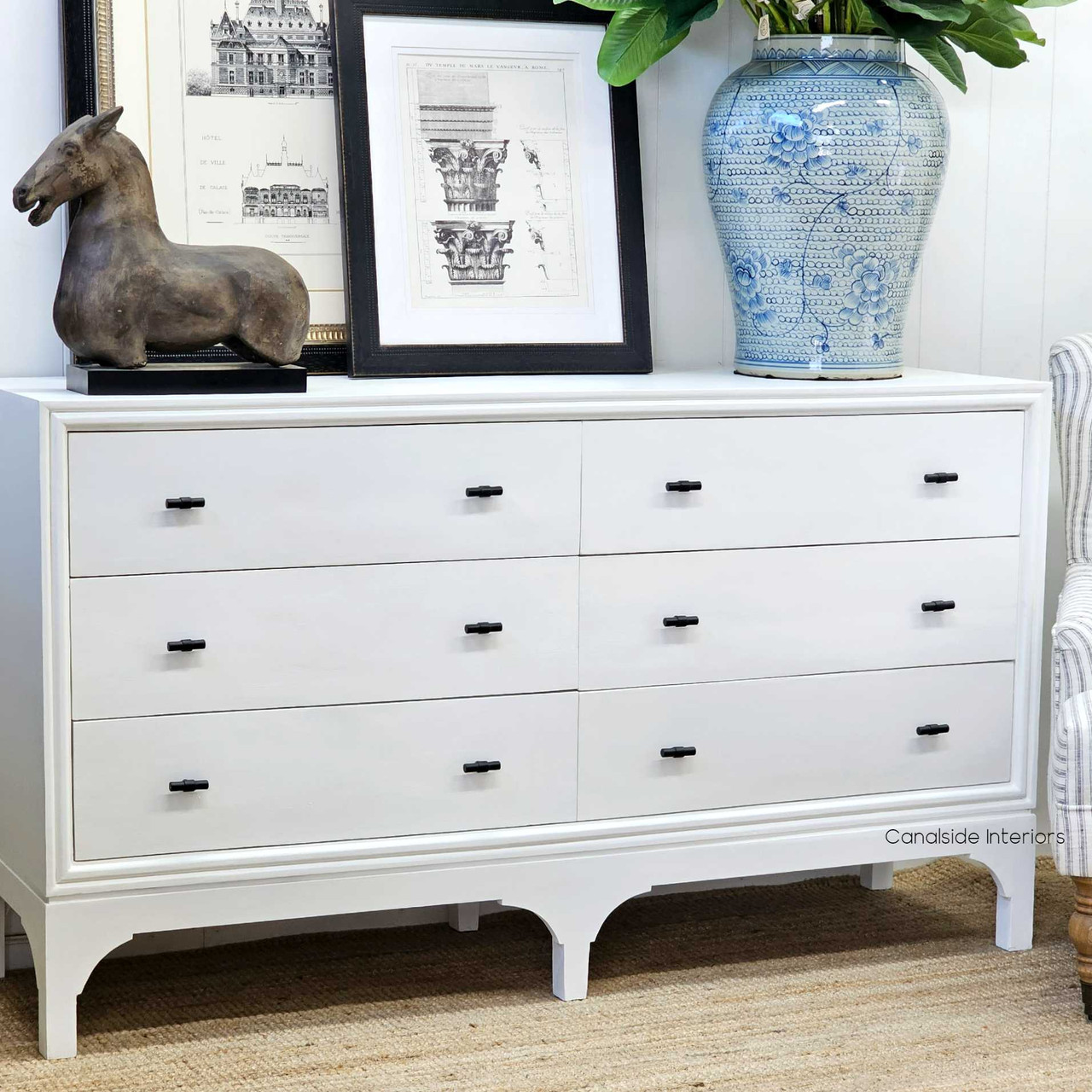 The Camille 6 Drawer Chest as a stylish storage solution in a lounge room, blending timeless elegance with modern design