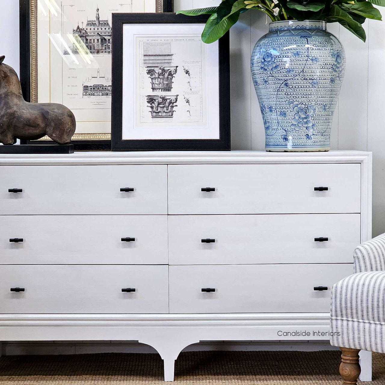 The Camille Chest in white, viewed from the front, offering a fresh and inviting addition to a coastal-inspired lounge room