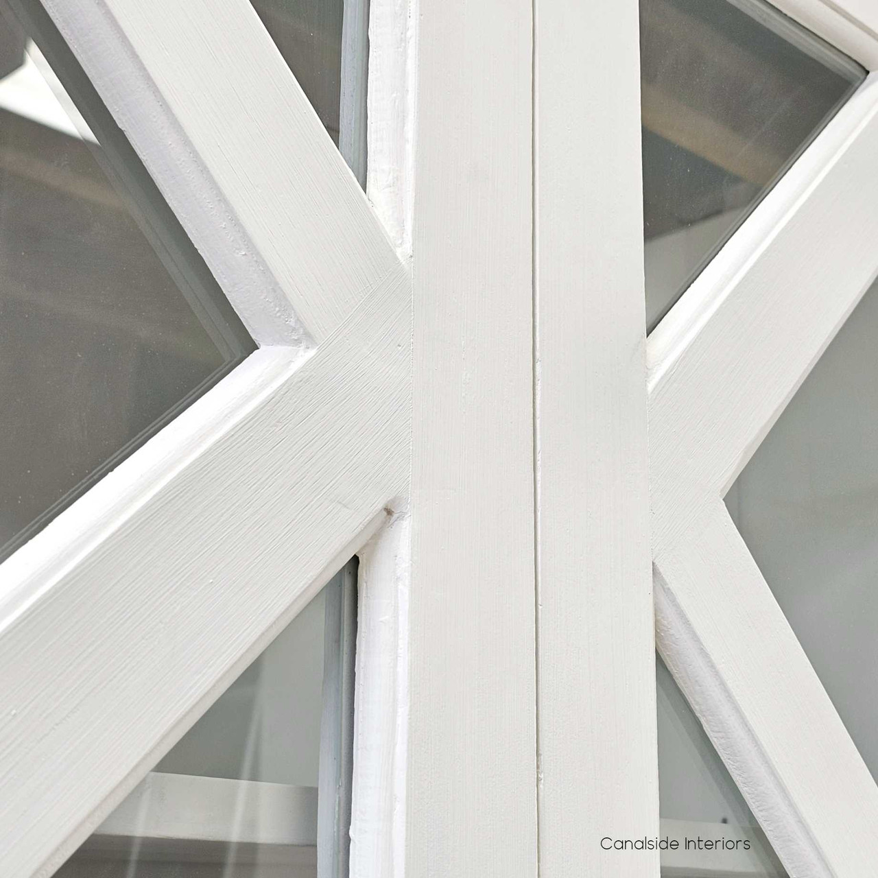 Close-up of the Tunbridge Glass Display Cabinet's hand-finished patina, highlighting the quality and attention to detail in its coastal, classical design