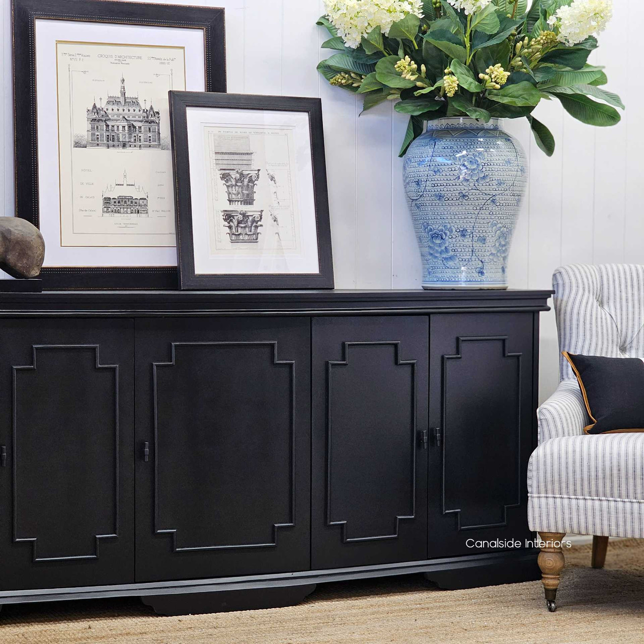 Angled perspective of the charcoal Leontine Sideboard, with a curved silhouette that complements modern Hamptons-style decor