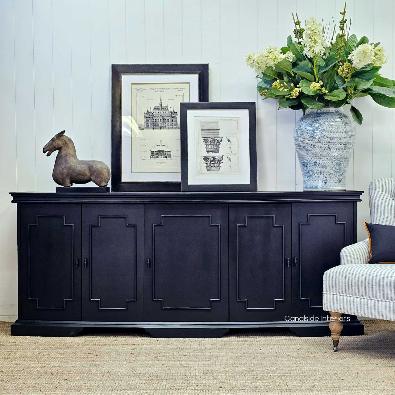 Frontal view highlighting the Leontine Sideboard’s curved front edge, seamlessly fitting into a refined bedroom decor