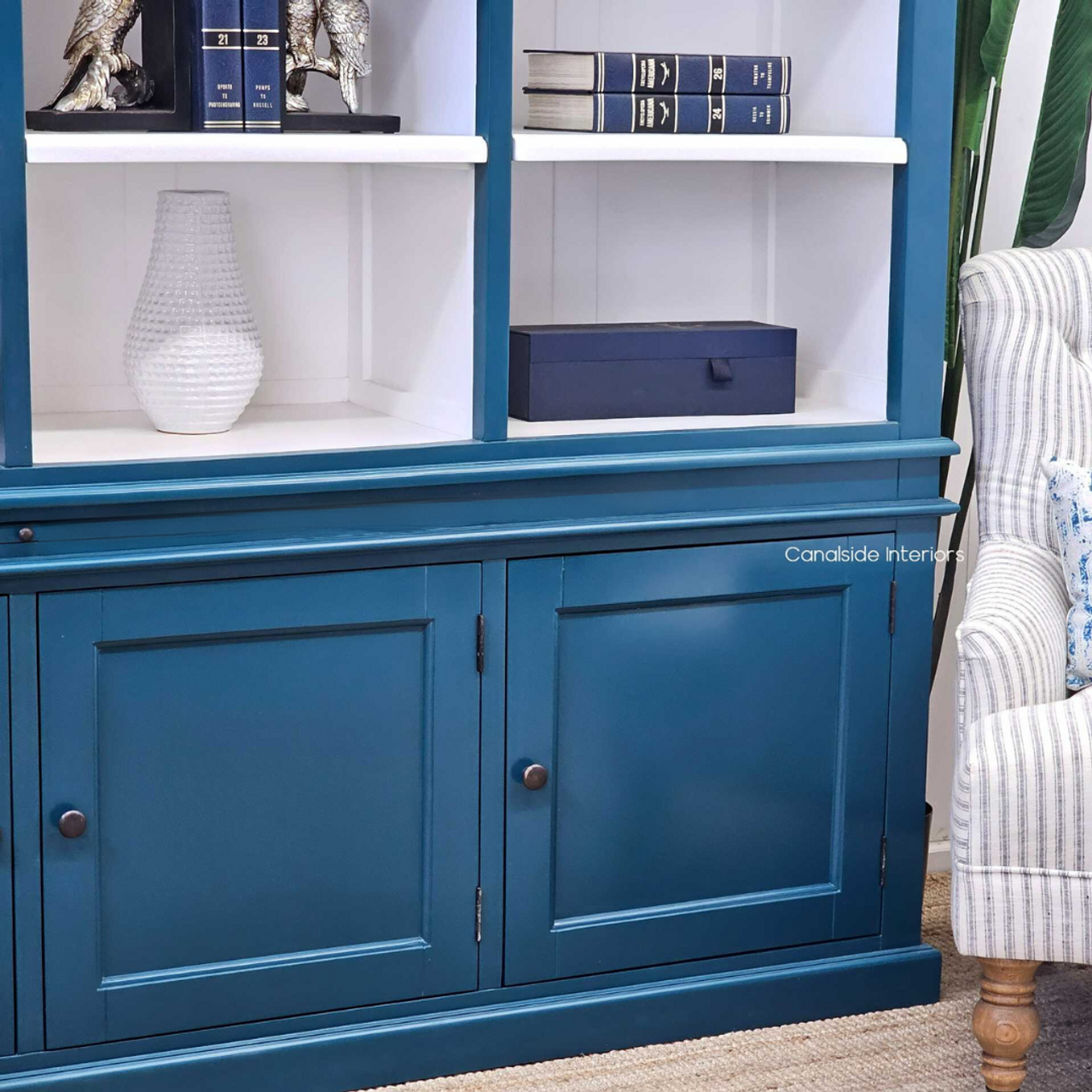 Teal Green Grange Wall Unit with open shelving, inviting a look at its ample space for home library