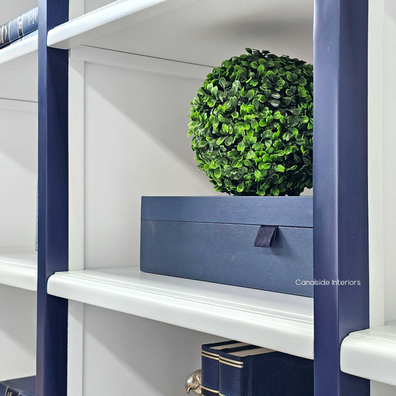 Angled perspective of the Grange Bookcase showcasing its minor distressing and spacious storage | Classical Detail.