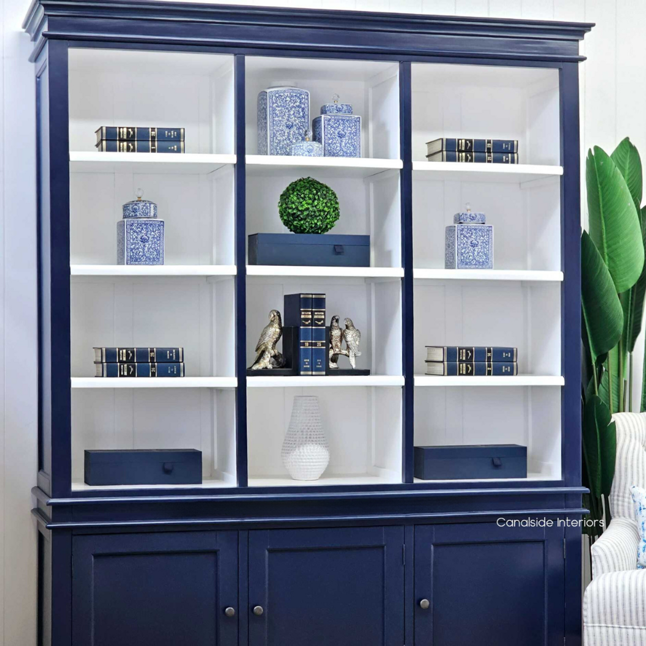 Angled view of the Grange 3 Door Wall Unit in navy blue, a Hamptons classic for living room elegance | Canalside Interiors