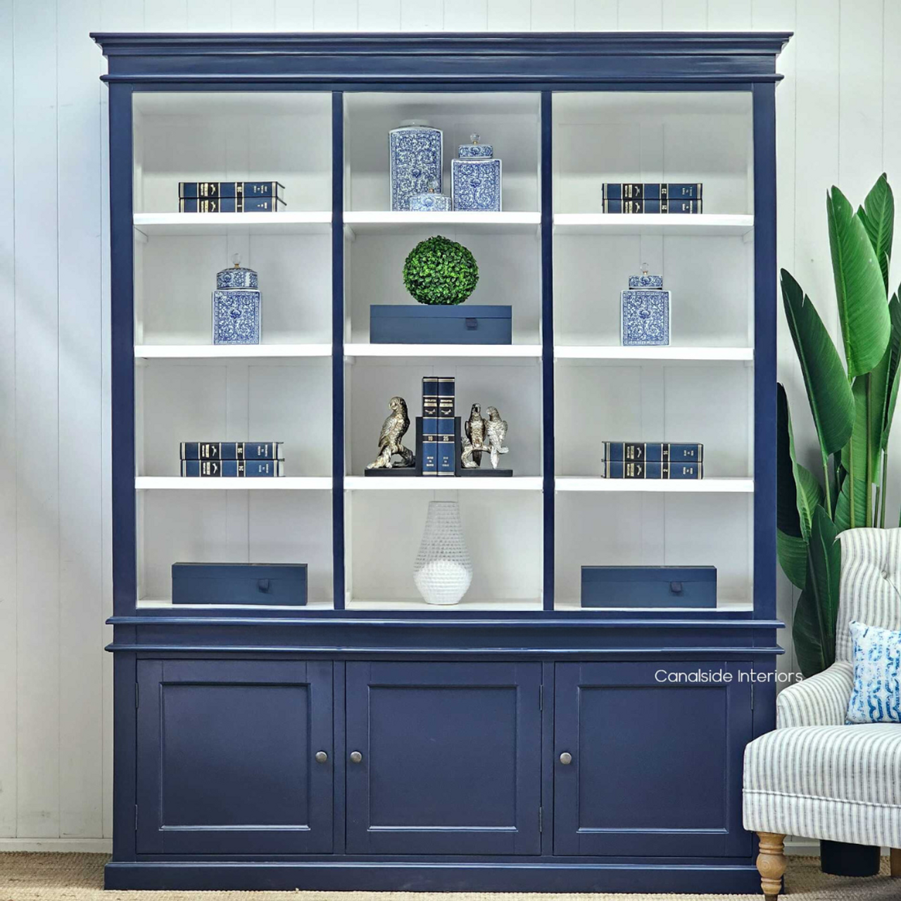 Full view of the navy blue Grange Bookshelf, a modern solution for home libraries | Canalside Interiors