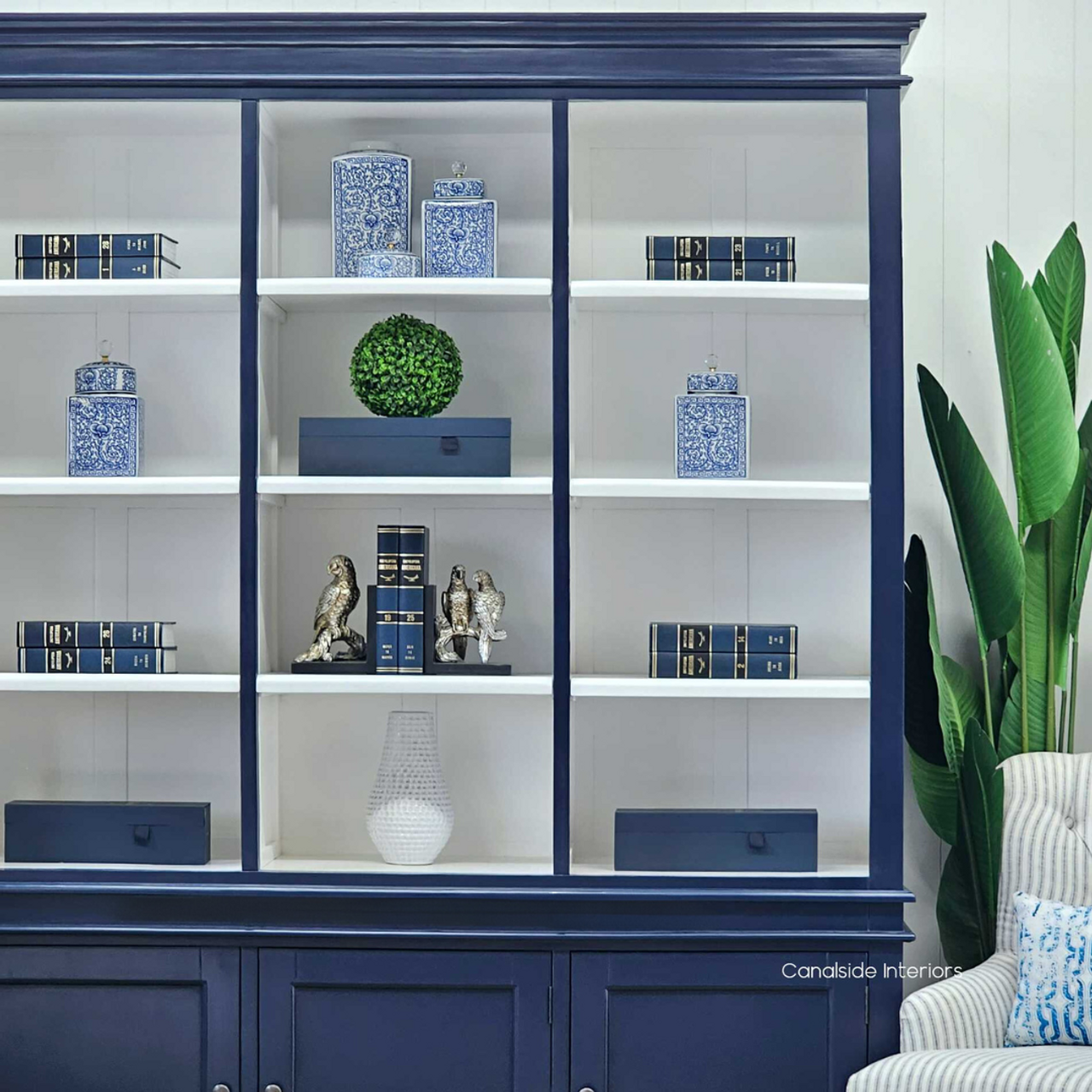 Navy blue Grange Bookshelf with white interior, a centrepiece in a Hamptons-style office | Canalside Quality