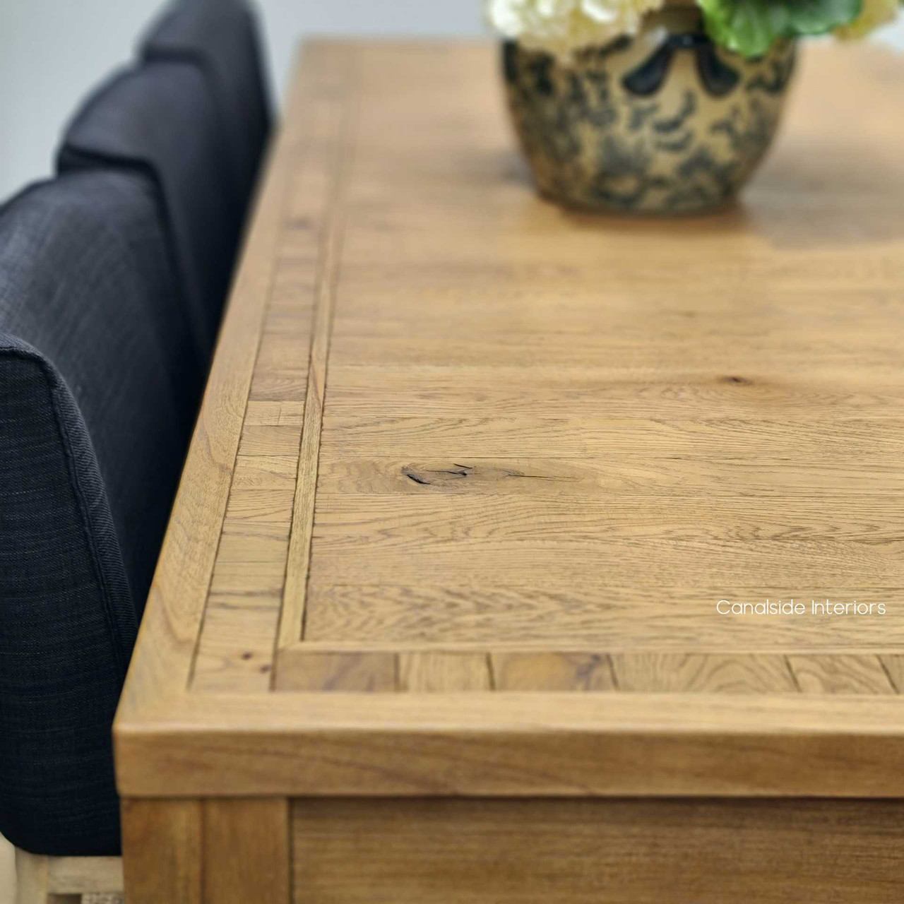 The Hayworth Table's parquetry banding detail, blending modern design with classical elegance.