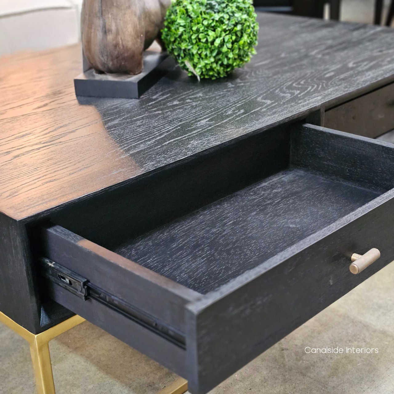 Close up detail of the St Lucia Coffee Table showing the metal runners